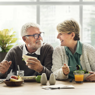 people eating and smiling